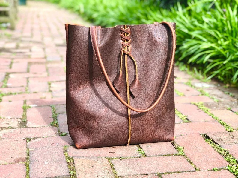 Tall brown leather tote tassels